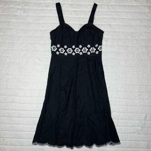 Chadwicks Black Sleeveless Dress with White Flower Band and Scalloped Hem